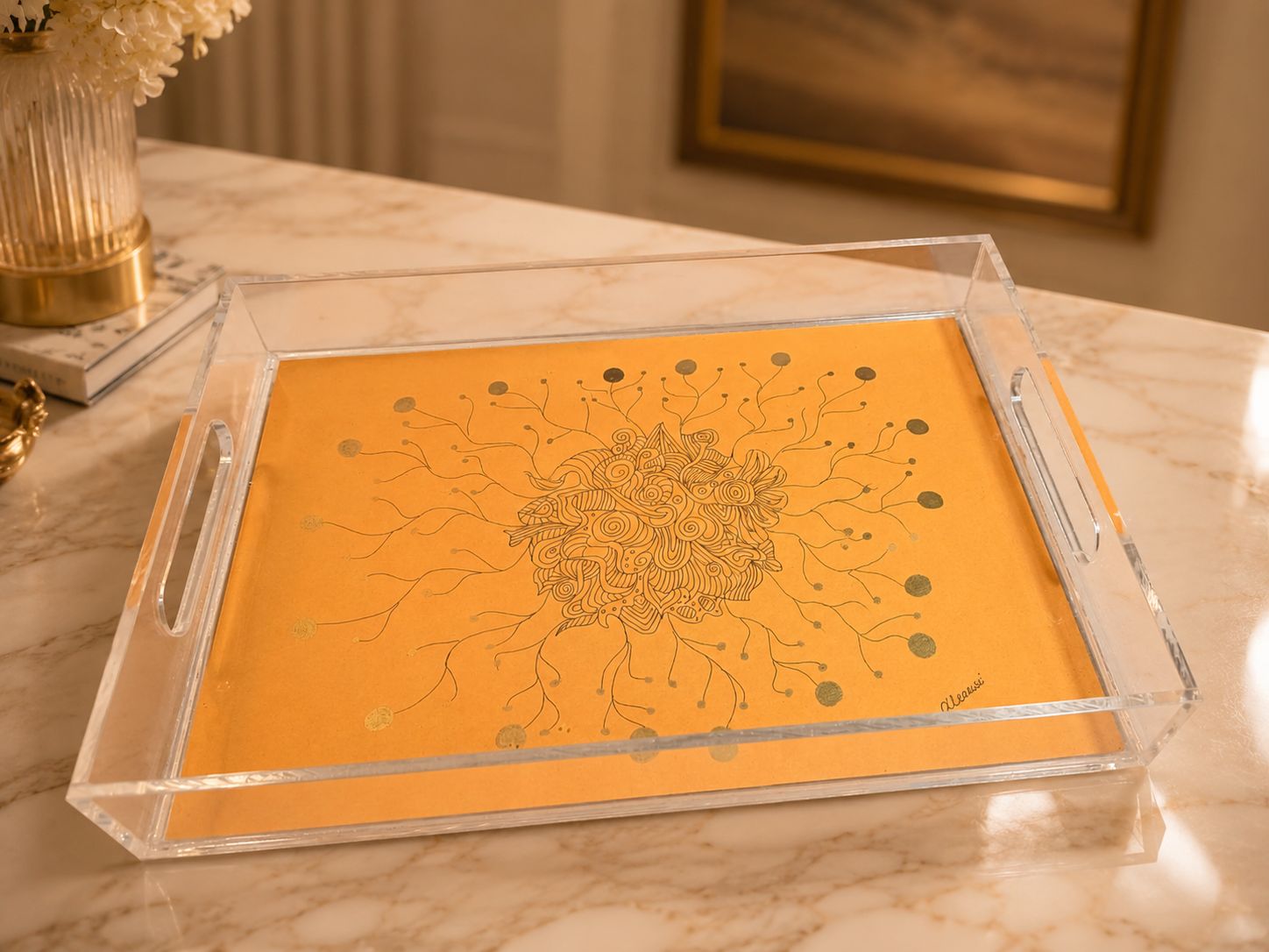 Decorative acrylic tray by Greek artist Aglaia Leoussi, featuring a vibrant orange artwork with black and gold details