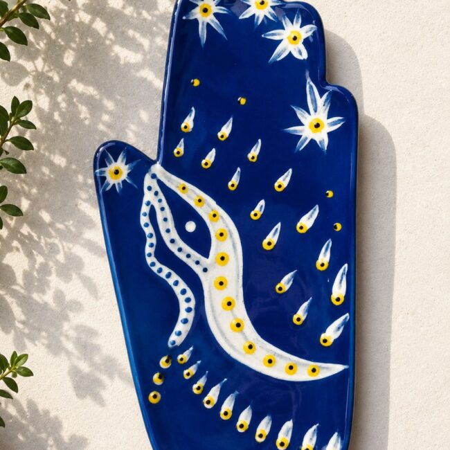 Happy Hands ceramic artwork by Greek artist Aglaia Leoussi, featuring a colorful hand-shaped sculpture with abstract painted patterns