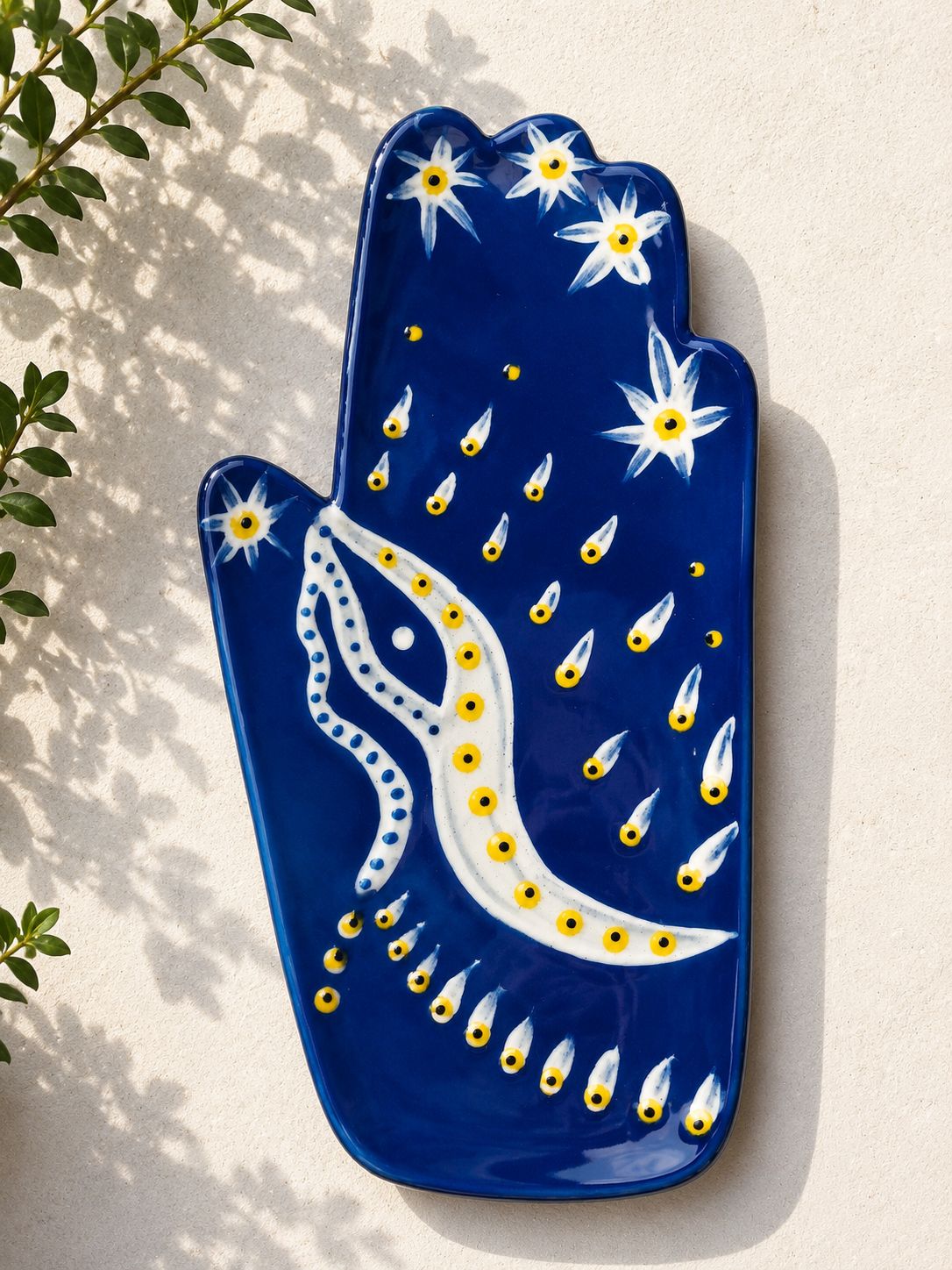 Happy Hands ceramic artwork by Greek artist Aglaia Leoussi, featuring a colorful hand-shaped sculpture with abstract painted patterns