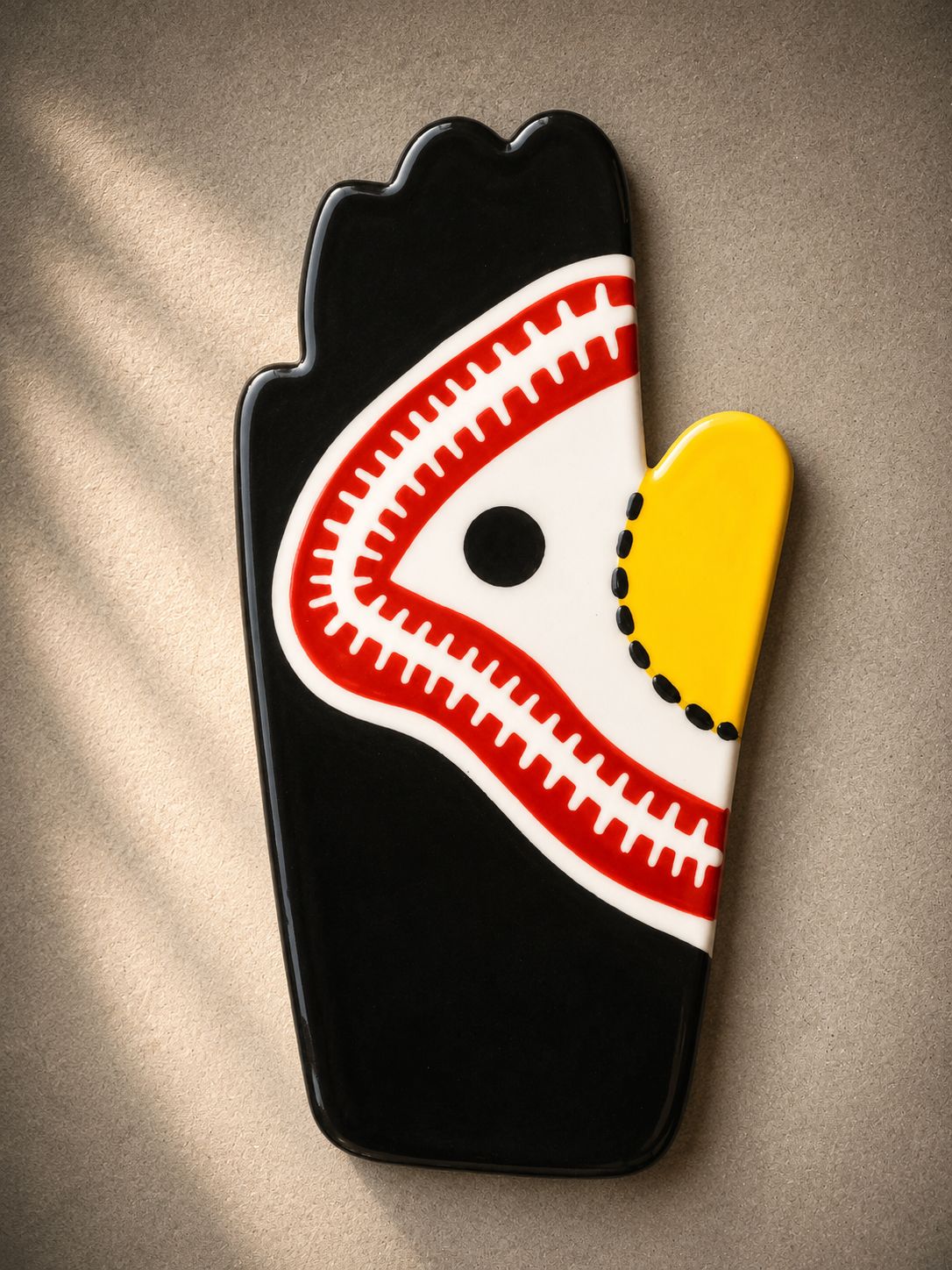 Happy Hands ceramic artwork by Greek artist Aglaia Leoussi, featuring a colorful hand-shaped sculpture with abstract painted patterns